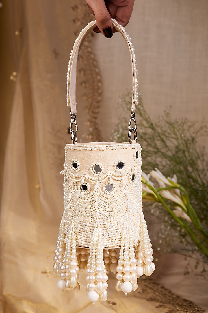 White Satin Pearl Hand Embroidered Potli Bag by House of Vian at Pernia's Pop Up Shop