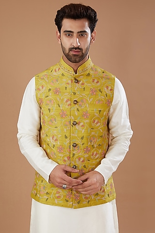 Yellow Raw Silk Floral Embroidered Nehru Jacket by HEER RANJHA