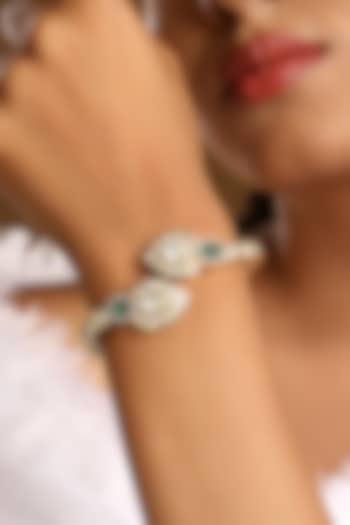 Micron Gold Finish Kundan Polki & Emerald Stone Enameled Bracelet by Hrisha Jewels at Pernia's Pop Up Shop