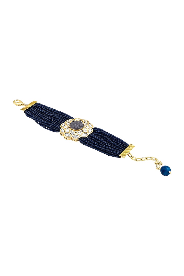 Gold Finish Blue Kundan Polki & Onyx Tumble Handcrafted Bracelet by Hrisha Jewels at Pernia's Pop Up Shop