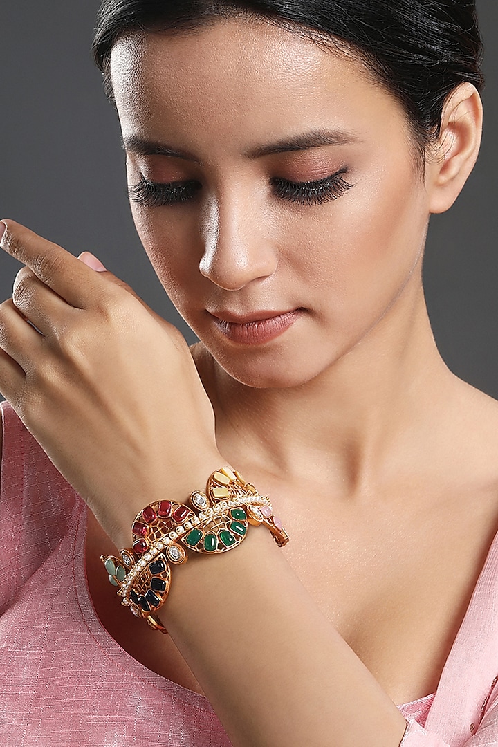 Gold Finish Navratna Stone Handcrafted Bracelet by Hrisha Jewels at Pernia's Pop Up Shop