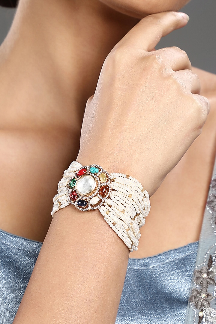 Gold Finish Pearl & Navratna Stone Handcrafted Bracelet by Hrisha Jewels at Pernia's Pop Up Shop