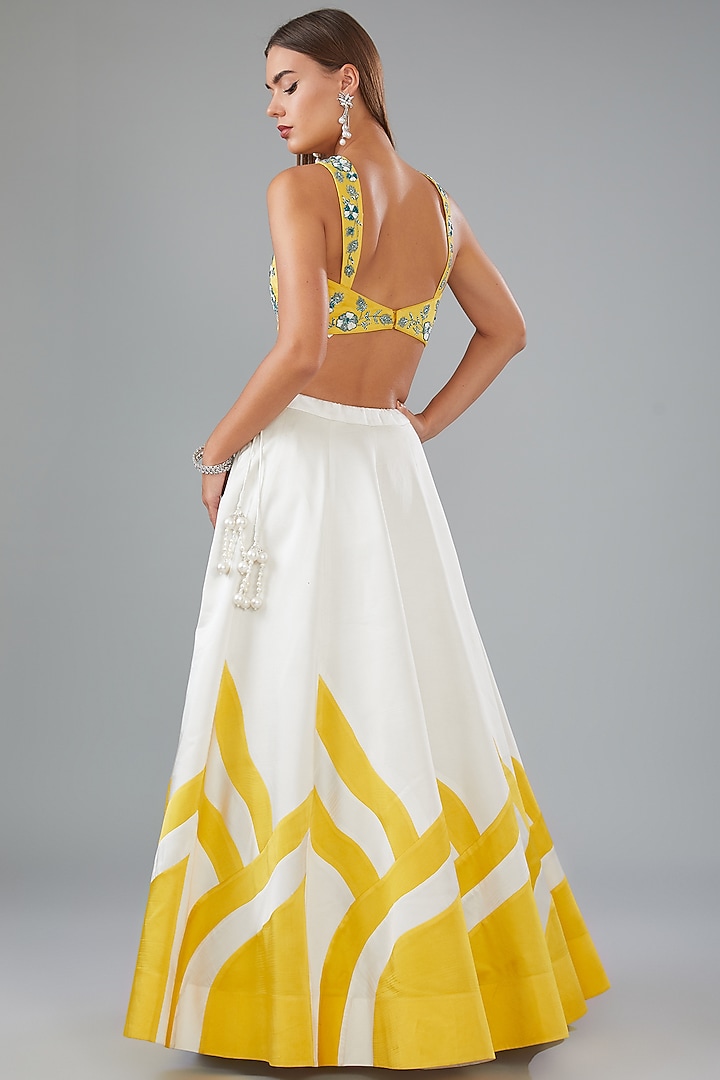 Yellow & White Satin Silk Applique Hand Embroidered Wedding Lehenga Set by HOUSE OF MAANSHREE at Pernia's Pop Up Shop