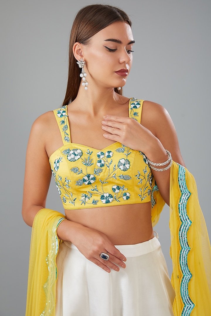 Yellow & White Satin Silk Applique Hand Embroidered Wedding Lehenga Set by HOUSE OF MAANSHREE at Pernia's Pop Up Shop