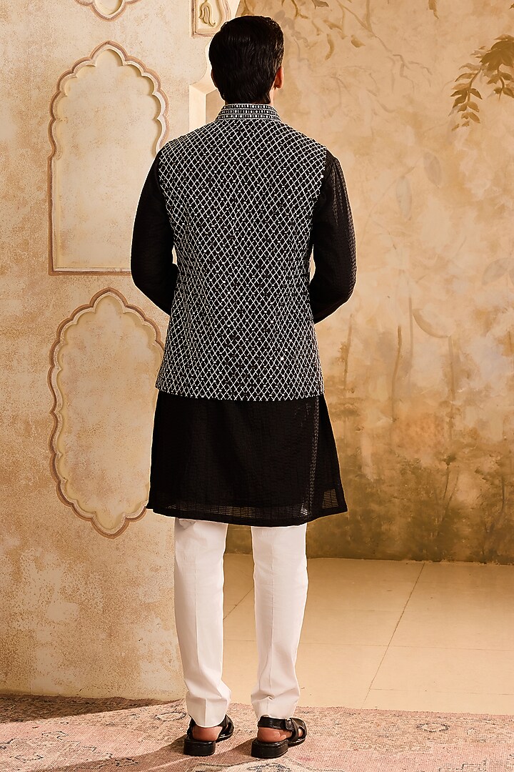 Black Raw Silk Resham Embroidered Bundi Jacket Set by NITIKA GUJRAL MEN at Pernia's Pop Up Shop