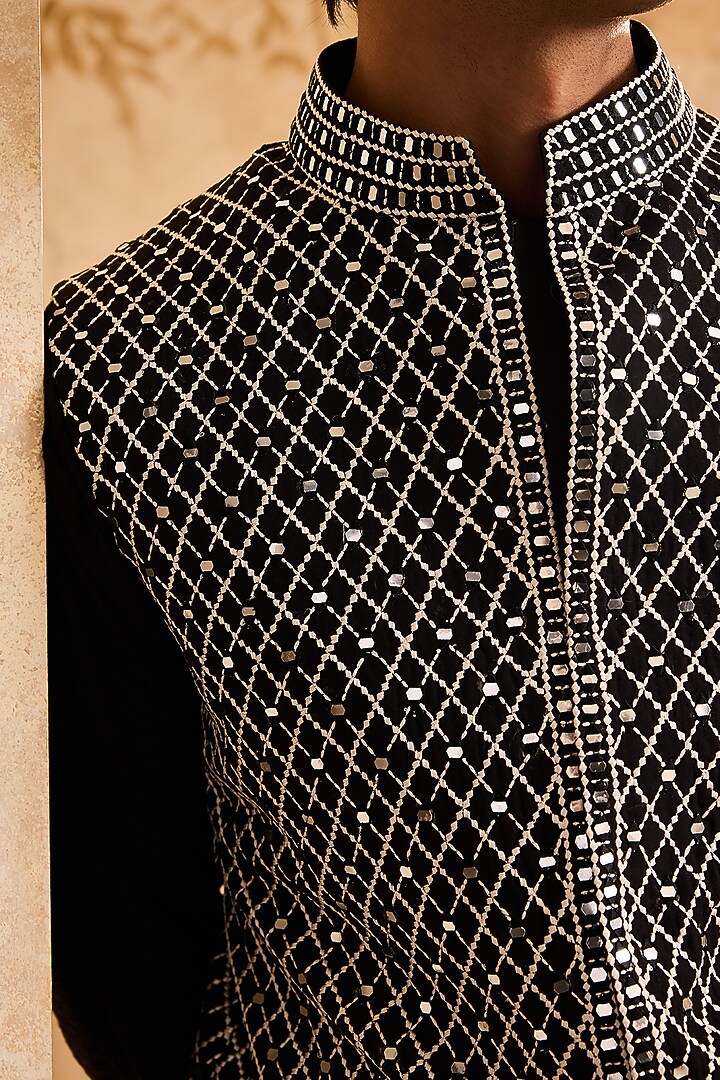 Black Raw Silk Resham Embroidered Bundi Jacket Set by NITIKA GUJRAL MEN at Pernia's Pop Up Shop
