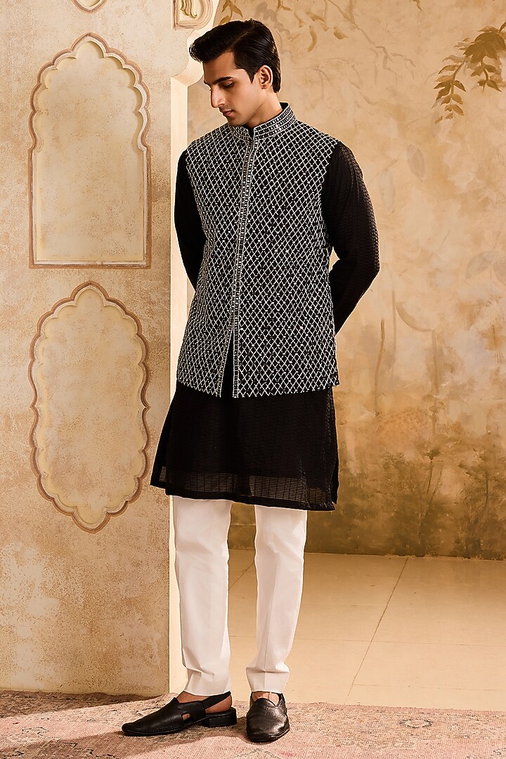 Black Raw Silk Resham Embroidered Bundi Jacket Set by NITIKA GUJRAL MEN at Pernia's Pop Up Shop