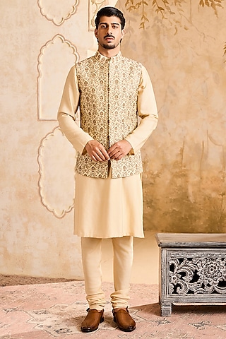 Beige Raw Silk Bead Work Bundi Jacket Set by NITIKA GUJRAL MEN
