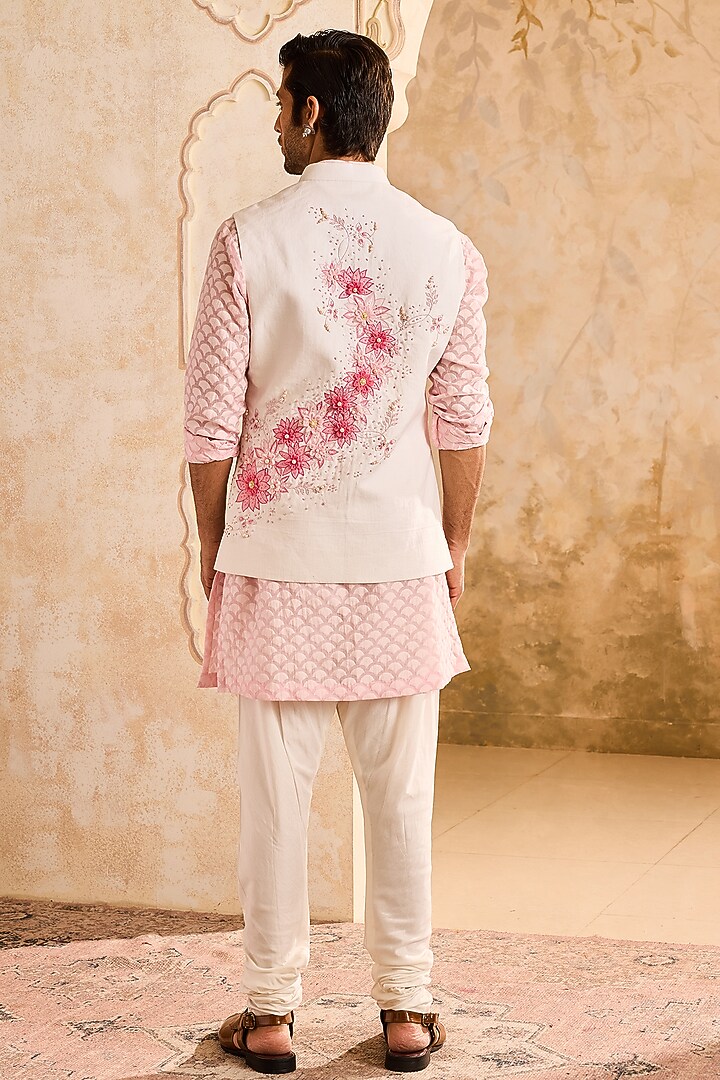 Ivory Linen 3D Floral Embroidered Bundi Jacket Set by NITIKA GUJRAL MEN at Pernia's Pop Up Shop