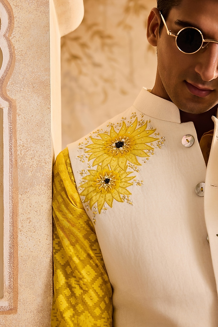 Ivory Linen 3D Floral Embroidered Bundi Jacket Set by NITIKA GUJRAL MEN at Pernia's Pop Up Shop