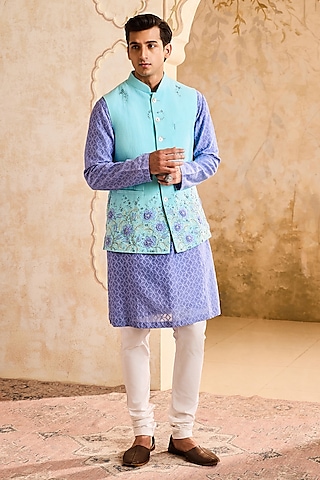 Turquoise Linen 3D Floral Embroidered Bundi Jacket Set by NITIKA GUJRAL MEN