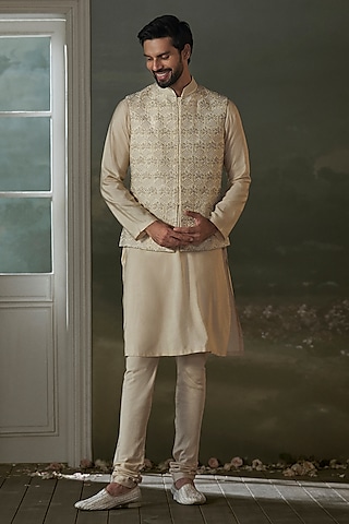 Beige Raw Silk Crystal Embroidered Bundi Jacket Set by NITIKA GUJRAL MEN