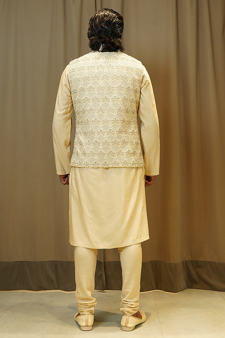 Beige Raw Silk Crystal Embroidered Bundi Jacket Set by NITIKA GUJRAL MEN at Pernia's Pop Up Shop