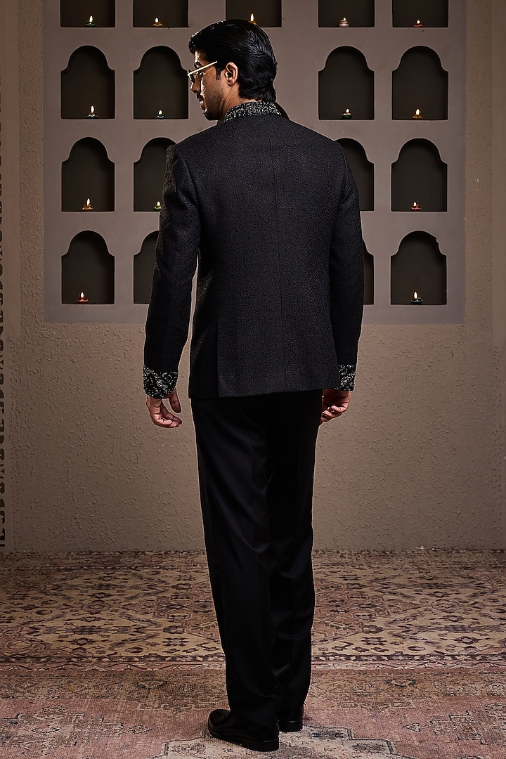 Black Raw Silk Resham Embroidered Jodhpuri Set by NITIKA GUJRAL MEN at Pernia's Pop Up Shop