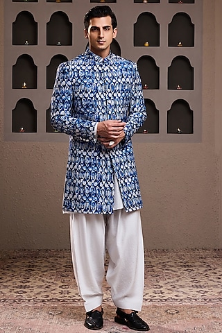 Indigo Raw Silk Printed Sherwani Set by NITIKA GUJRAL MEN