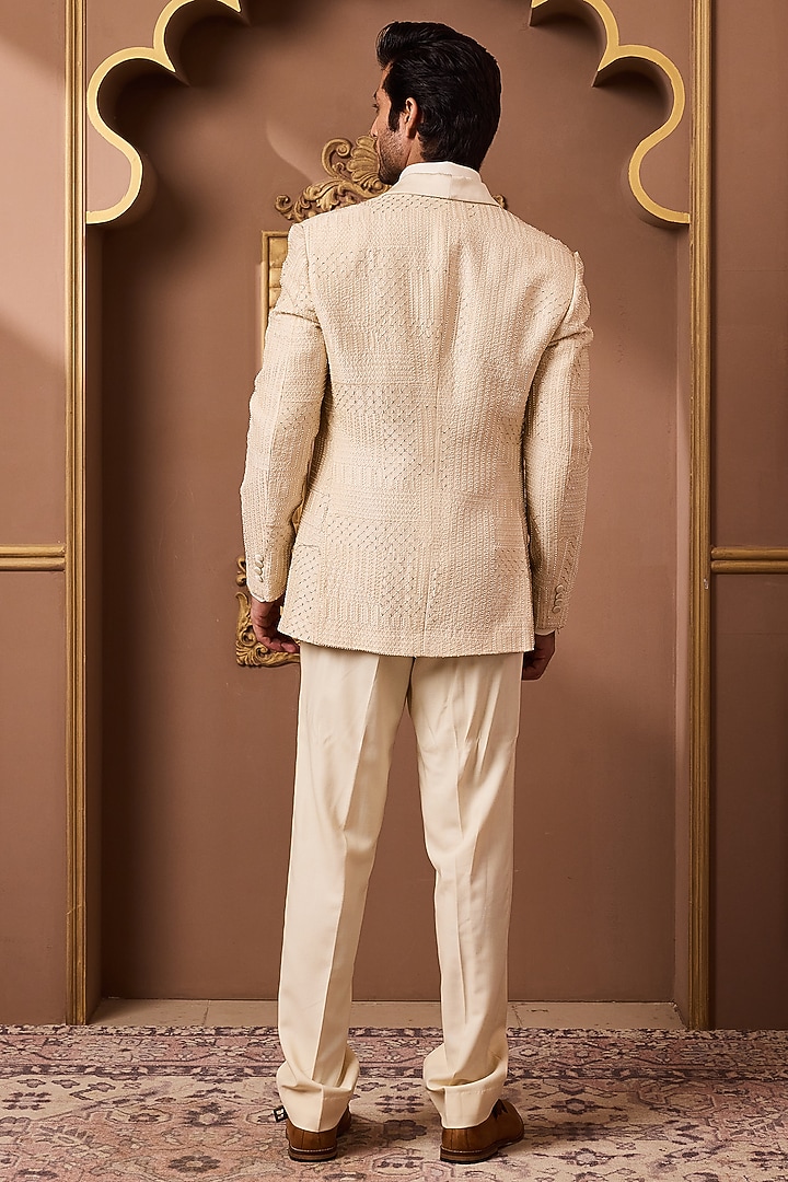 Beige Raw Silk Resham Embroidered Tuxedo Set by NITIKA GUJRAL MEN at Pernia's Pop Up Shop