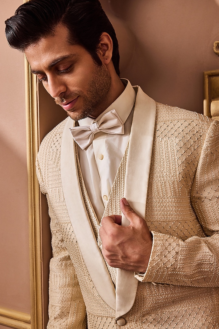 Beige Raw Silk Resham Embroidered Tuxedo Set by NITIKA GUJRAL MEN at Pernia's Pop Up Shop