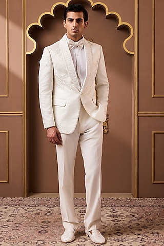 Ivory Poly Jacquard & Suiting Embroidered Tuxedo Set by NITIKA GUJRAL MEN