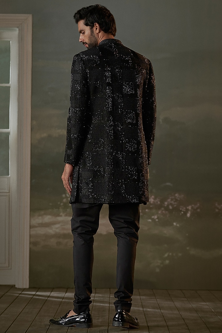 Black Raw Silk Resham Embroidered Groom Sherwani Set by NITIKA GUJRAL MEN at Pernia's Pop Up Shop
