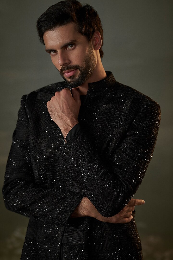 Black Raw Silk Resham Embroidered Groom Sherwani Set by NITIKA GUJRAL MEN at Pernia's Pop Up Shop