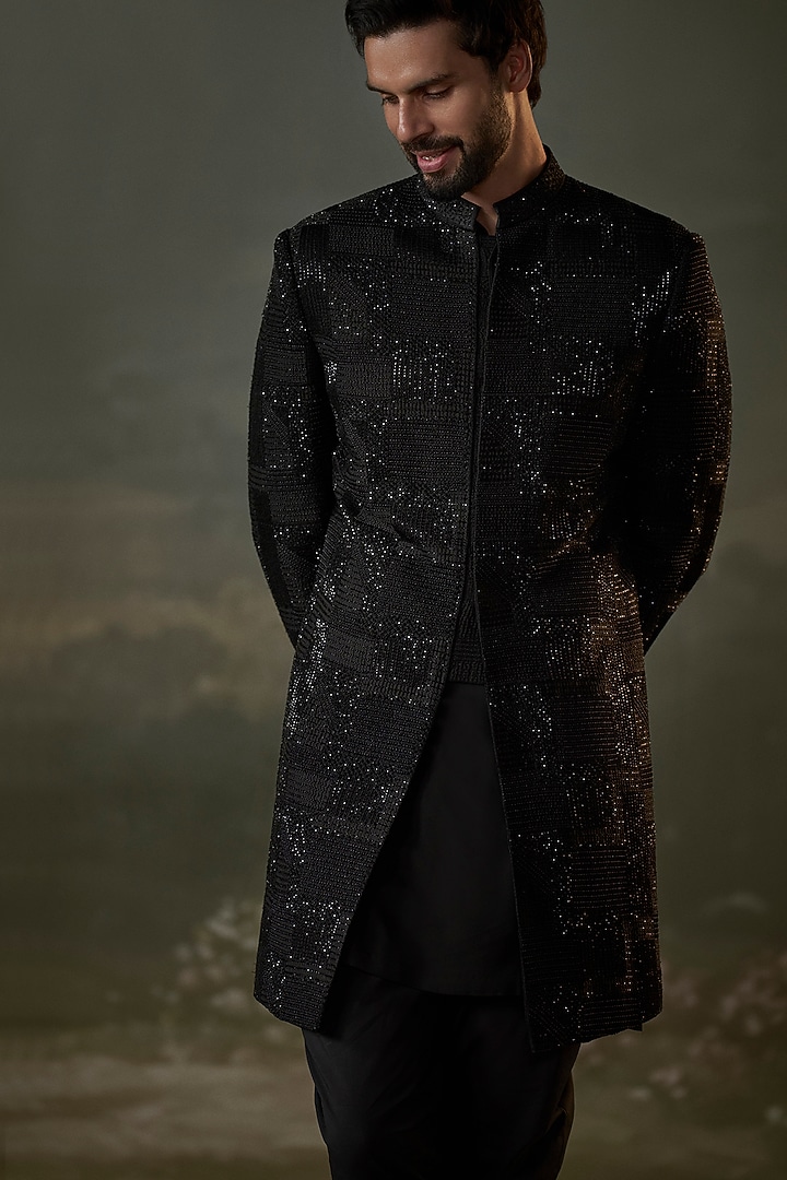 Black Raw Silk Resham Embroidered Groom Sherwani Set by NITIKA GUJRAL MEN at Pernia's Pop Up Shop