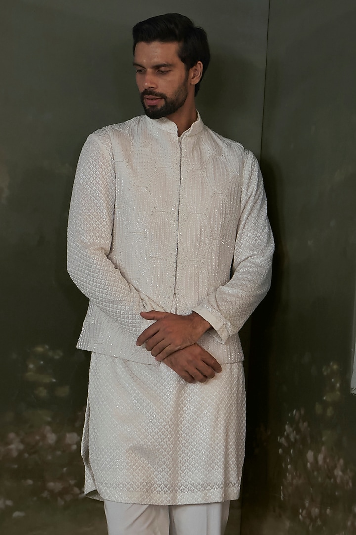 Ivory Raw Silk Sequins Embroidered Bundi Jacket Set by NITIKA GUJRAL MEN at Pernia's Pop Up Shop