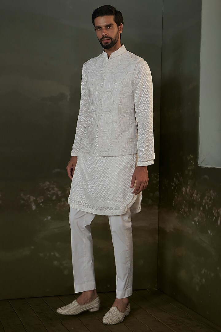 Ivory Raw Silk Sequins Embroidered Bundi Jacket Set by NITIKA GUJRAL MEN at Pernia's Pop Up Shop