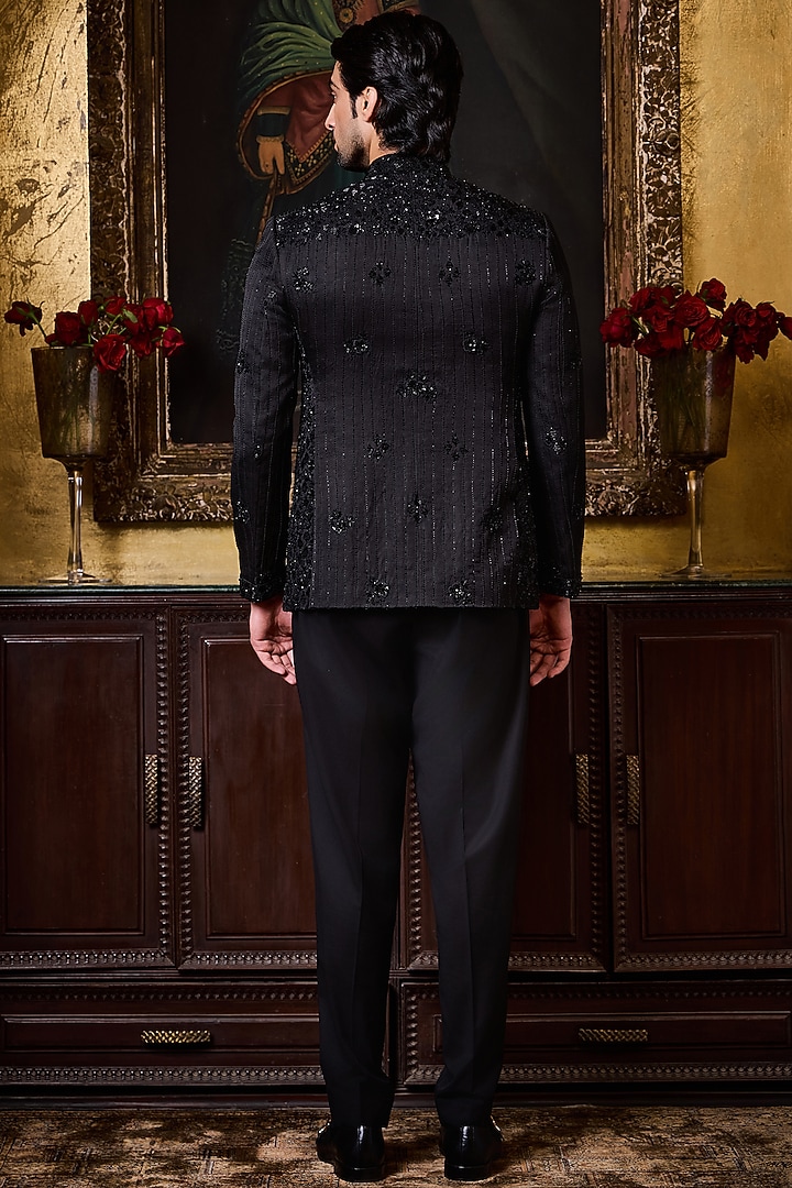 Black Raw Silk Resham Embroidered Jodhpuri Set by NITIKA GUJRAL MEN at Pernia's Pop Up Shop