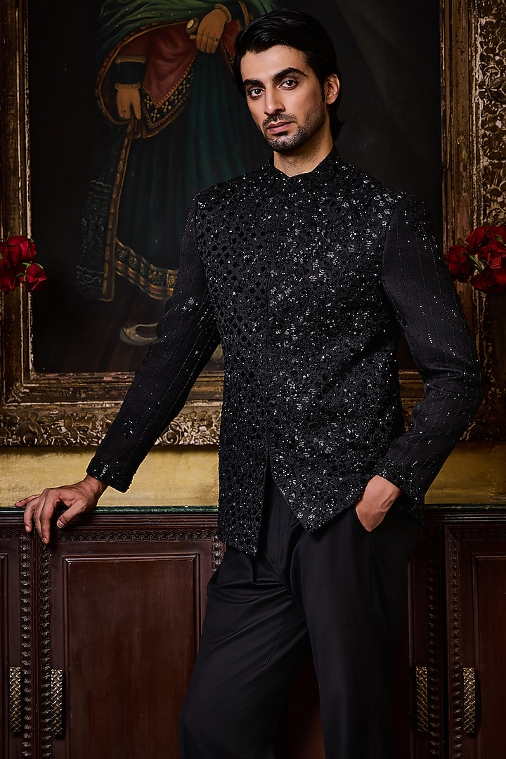 Black Raw Silk Resham Embroidered Jodhpuri Set by NITIKA GUJRAL MEN at Pernia's Pop Up Shop
