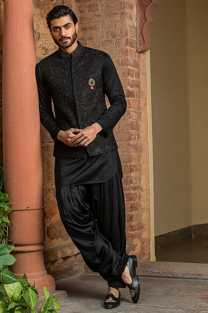 Black Raw Silk Embroidered Bundi Jacket Set by NITIKA GUJRAL MEN at Pernia's Pop Up Shop