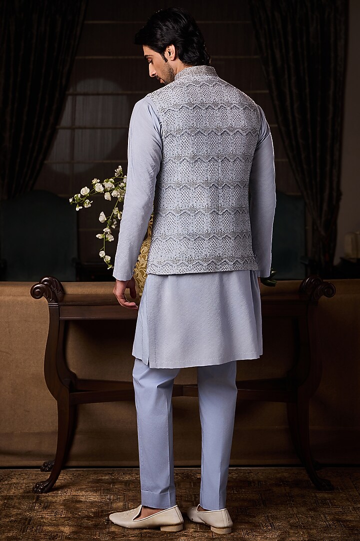 Powder Blue Raw Silk Embroidered Bundi Set by NITIKA GUJRAL MEN at Pernia's Pop Up Shop