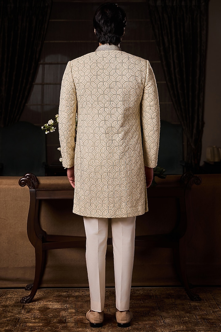 Beige Raw Silk Resham Embroidered Wedding Sherwani Set by NITIKA GUJRAL MEN at Pernia's Pop Up Shop