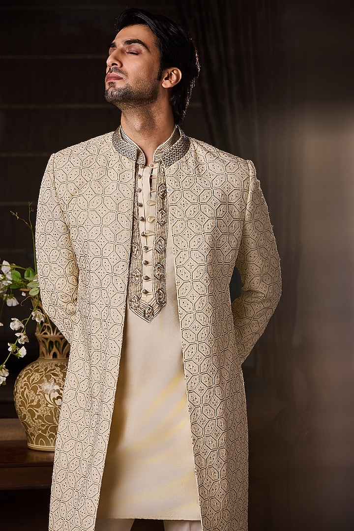 Beige Raw Silk Resham Embroidered Wedding Sherwani Set by NITIKA GUJRAL MEN at Pernia's Pop Up Shop