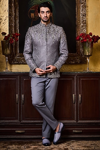 Grey Raw Silk Resham Embroidered Jodhpuri Set by NITIKA GUJRAL MEN