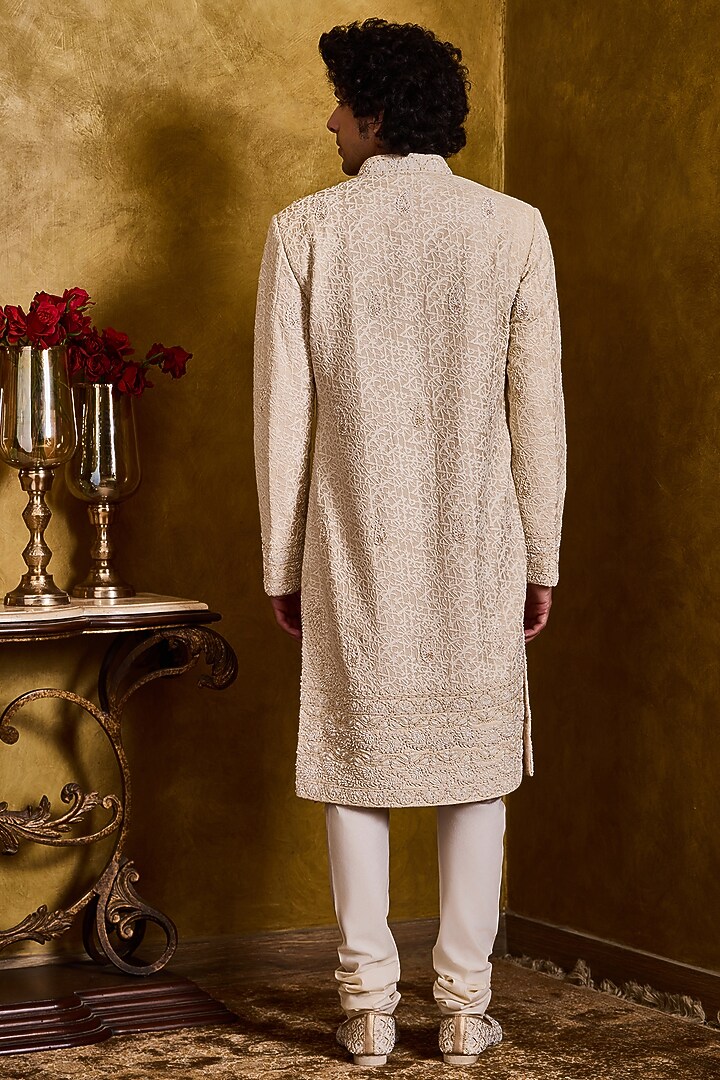 Beige Raw Silk Resham Embroidered Groom Sherwani Set by NITIKA GUJRAL MEN at Pernia's Pop Up Shop