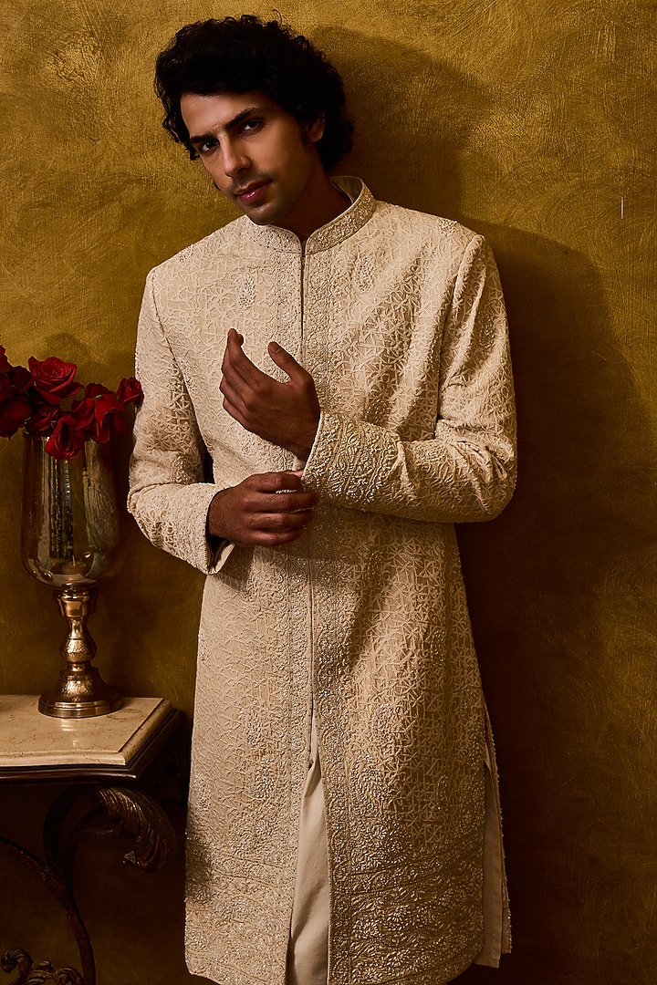 Beige Raw Silk Resham Embroidered Groom Sherwani Set by NITIKA GUJRAL MEN at Pernia's Pop Up Shop