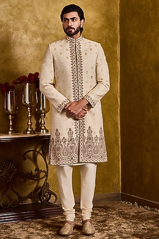 Beige Moonga Tussar Dabka Embroidered Woven Sherwani Set by NITIKA GUJRAL MEN