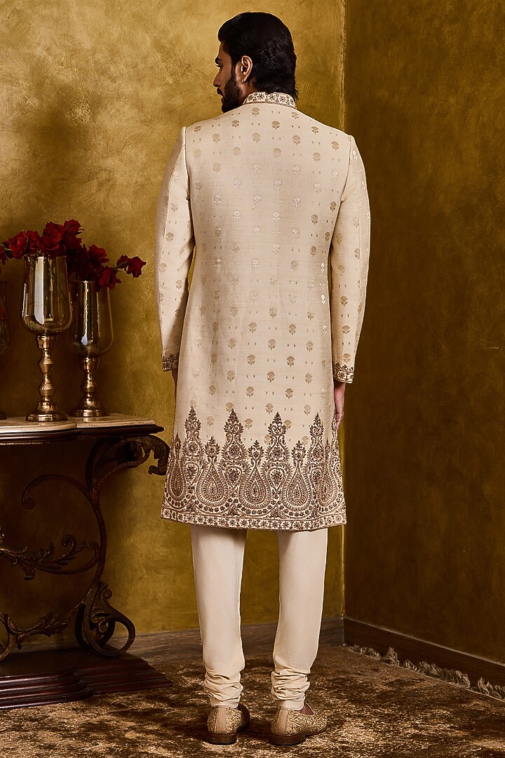 Beige Moonga Tussar Dabka Embroidered Woven Wedding Sherwani Set by NITIKA GUJRAL MEN at Pernia's Pop Up Shop