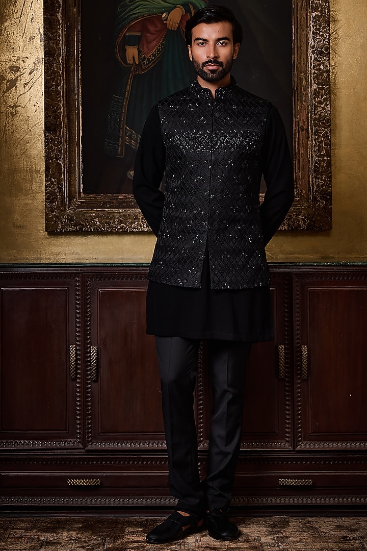 Black Raw Silk Resham Embroidered Bundi Set by NITIKA GUJRAL MEN at Pernia's Pop Up Shop