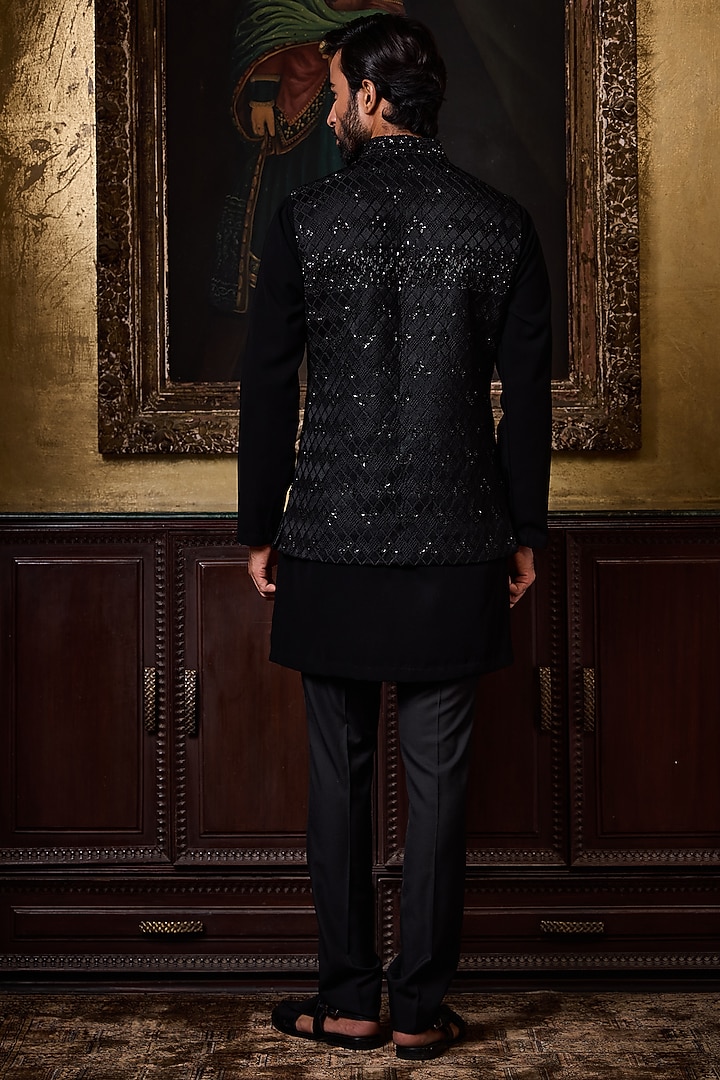 Black Raw Silk Resham Embroidered Bundi Set by NITIKA GUJRAL MEN at Pernia's Pop Up Shop
