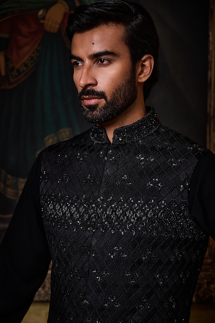 Black Raw Silk Resham Embroidered Bundi Set by NITIKA GUJRAL MEN at Pernia's Pop Up Shop