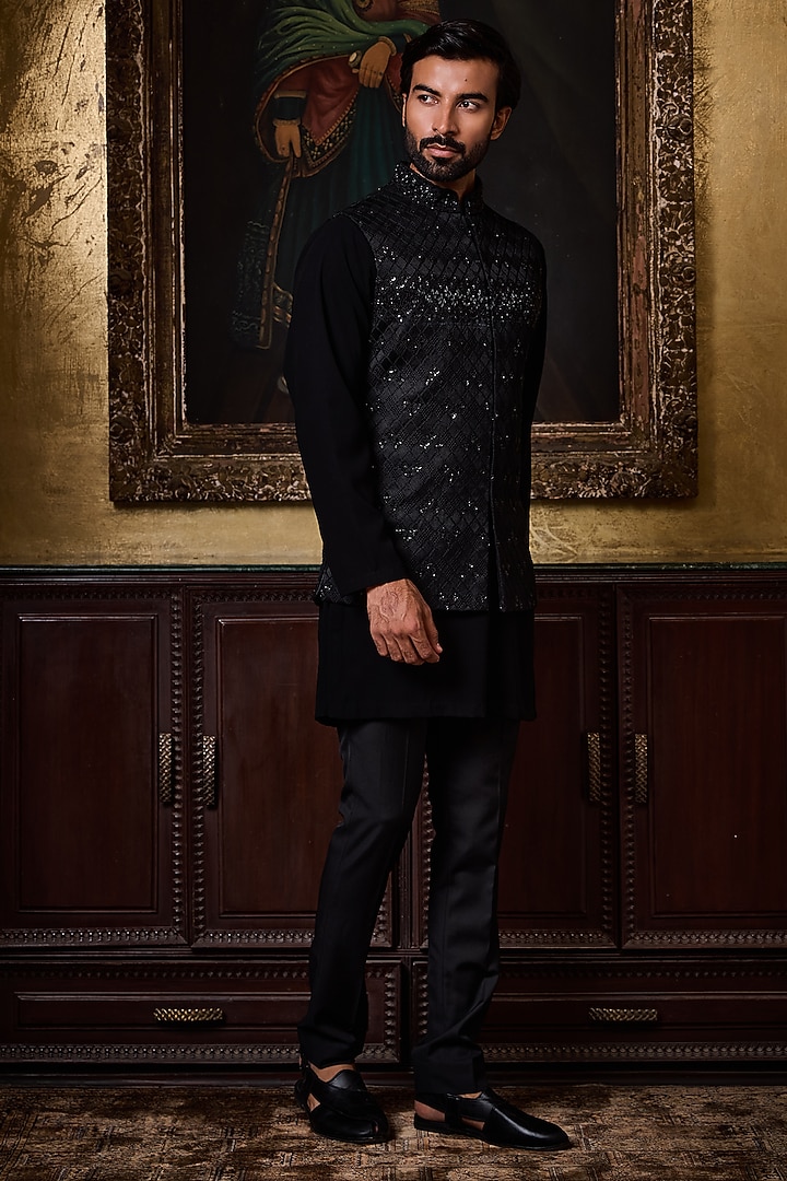 Black Raw Silk Resham Embroidered Bundi Set by NITIKA GUJRAL MEN at Pernia's Pop Up Shop