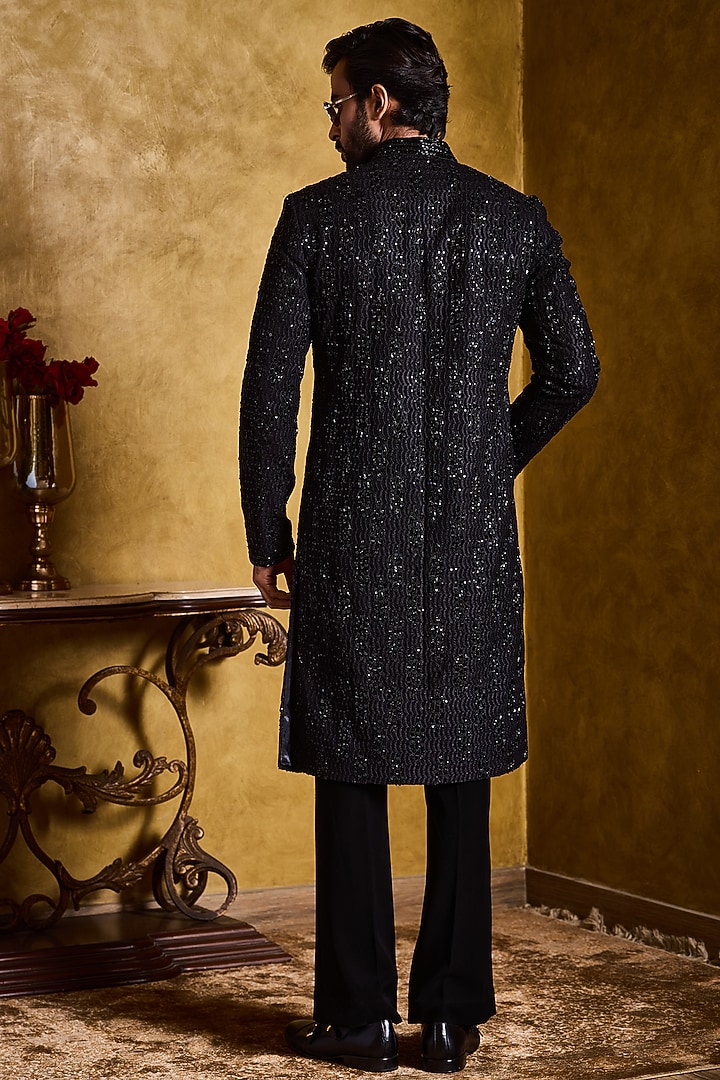 Black Raw Silk Resham Embroidered Groom Sherwani Set by NITIKA GUJRAL MEN at Pernia's Pop Up Shop