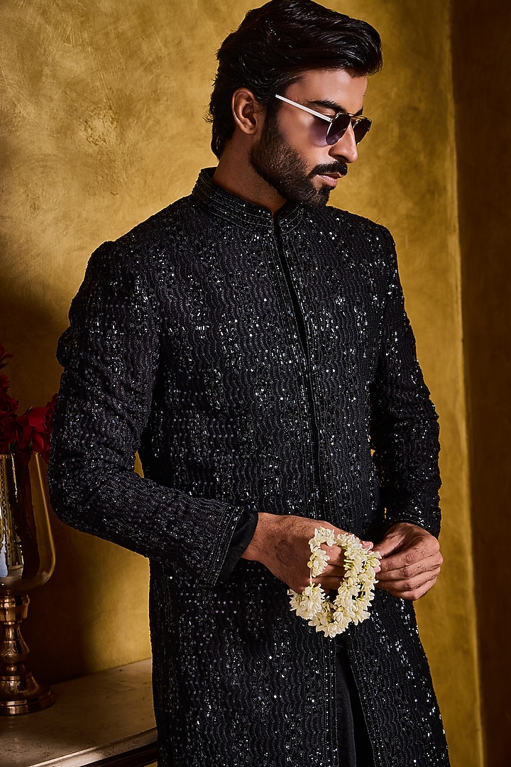 Black Raw Silk Resham Embroidered Groom Sherwani Set by NITIKA GUJRAL MEN at Pernia's Pop Up Shop