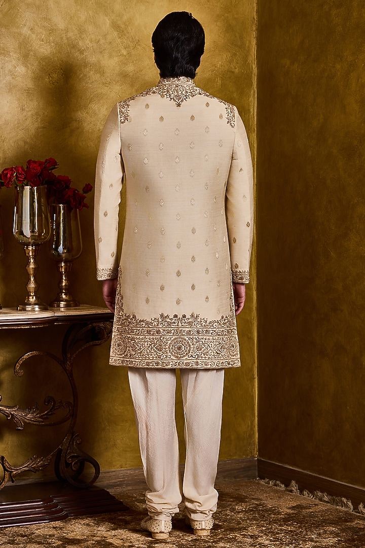 Beige Moonga Tussar Dabka Embroidered Woven Groom Sherwani Set by NITIKA GUJRAL MEN at Pernia's Pop Up Shop
