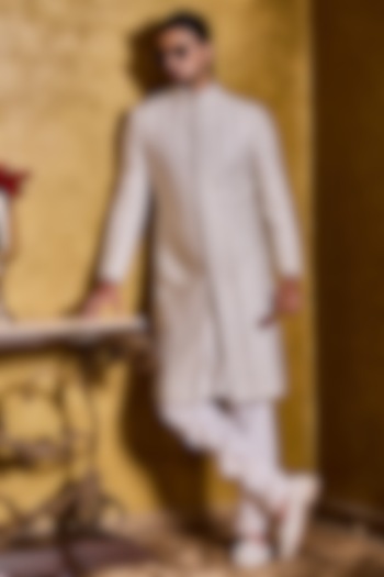 Ivory Raw Silk Resham Embroidered Sherwani Set by Histori