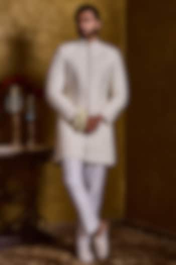 Ivory Raw Silk Resham Embroidered Groom Sherwani Set by Histori at Pernia's Pop Up Shop