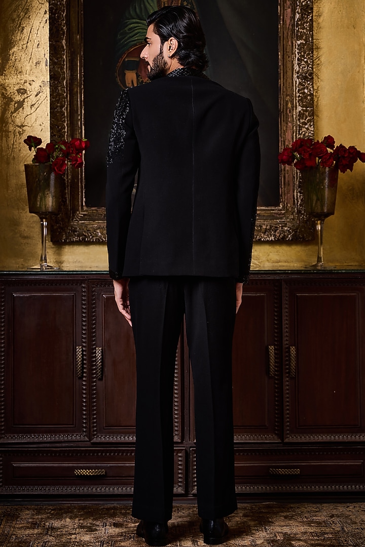 Black Premium Suiting Crystal Embroidered Wedding Indowestern Set by NITIKA GUJRAL MEN at Pernia's Pop Up Shop