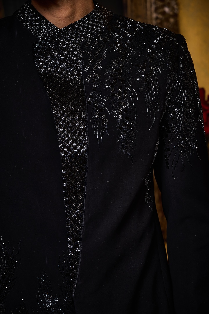 Black Premium Suiting Crystal Embroidered Wedding Indowestern Set by NITIKA GUJRAL MEN at Pernia's Pop Up Shop