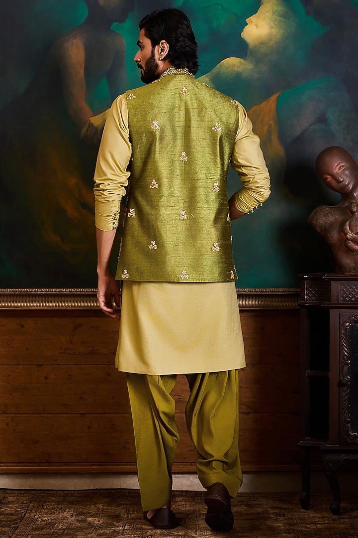 Olive Green Raw Silk Resham Embroidered Bundi Set by NITIKA GUJRAL MEN at Pernia's Pop Up Shop